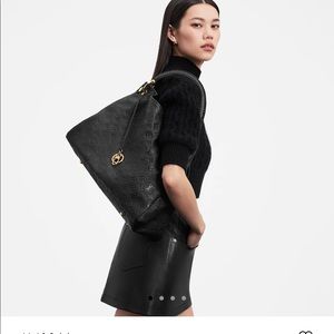 Louis Vuitton monogram Artsy MM